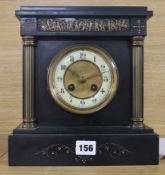 A small black slate clock