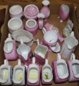 A collection of German pink lustre and white-glazed souvenir china, including jugs, preserve pots,