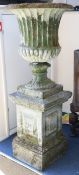 An urn and pedestal, W.60cm