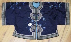 A Chinese midnight blue silk jacket