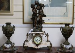 A 19th century French gilt spelter and variegated marble three piece clock set, with figural
