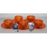 A set of 5 orange Venetian jelly glasses, stands and pair slag glass candle holders