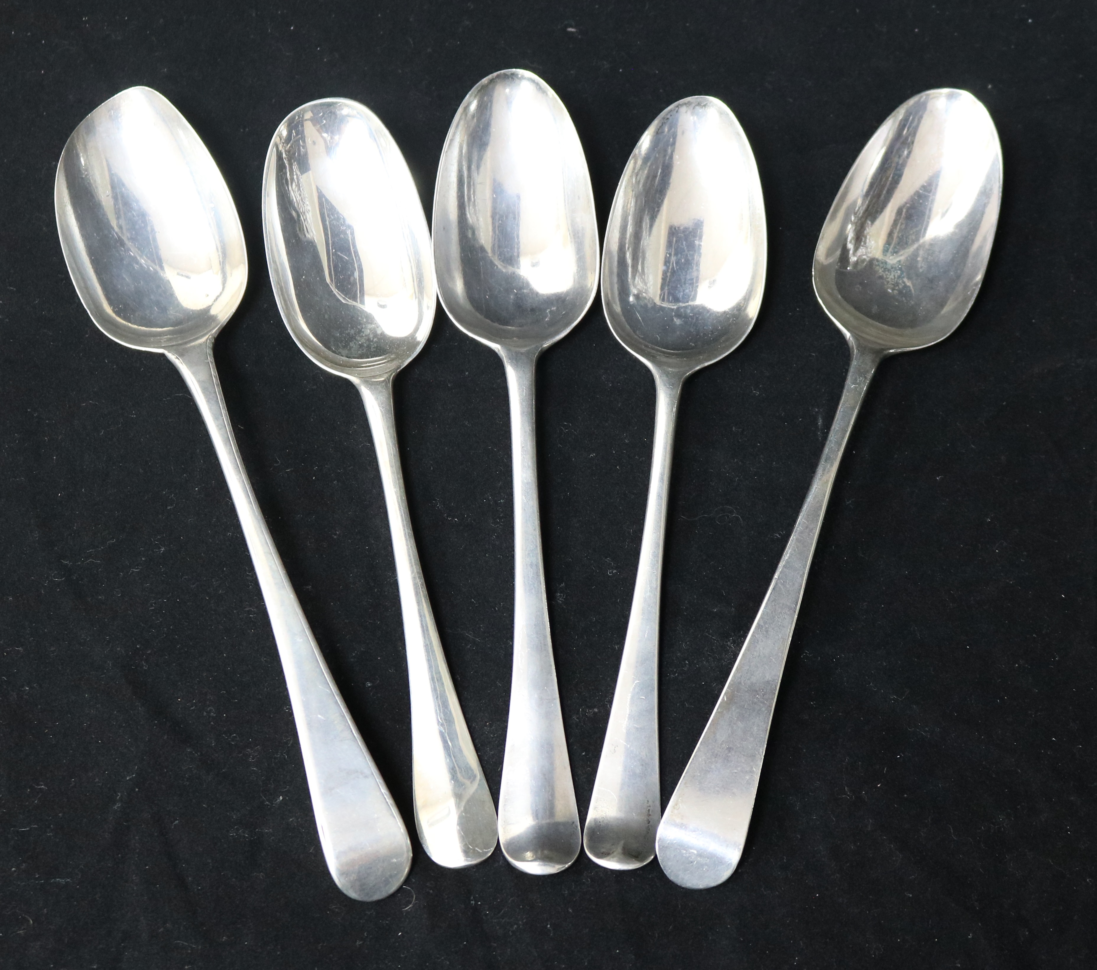 Five assorted 18th century silver tablespoons, 9 oz.