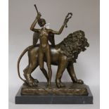 After Demetre Chiparus. A bronze lion with angel trumpeter, height 38cm