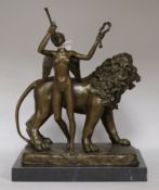 After Demetre Chiparus. A bronze lion with angel trumpeter, height 38cm
