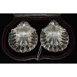 A cased pair of late Victorian silver shell shaped dishes by Atkin Brothers, Sheffield, 1896.