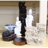 A quantity of Chinese ceramics and wooden stands