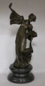 After A. Leonard. A bronze lady in a ballgown, height 41.5cm