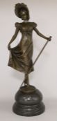 An Art Nouveau style bronze figure of a girl with a staff, height 42cm