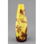 A Galle cameo glass conical vase, c.1905, decorated with a flowering climbing plant in brown, on a