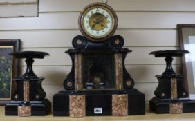 A 19th century French black and rouge marble three piece clock garniture, height 48cm