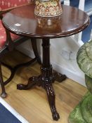 A pair of Victorian style mahogany circular tripod tables, H.73cm