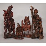 Four Chinese carved wood figures