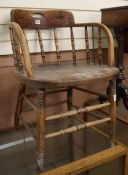 A late 19th century spindle back chair