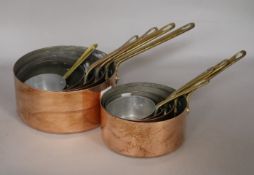 9 copper graduated saucepans