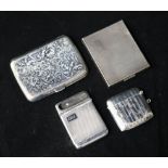 A silver cigarette case, a compact, a vesta and a match case.