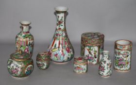 A group of Chinese Famille Rose vases, jars and covers