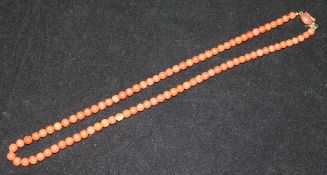 A coral bead necklace, 20in.