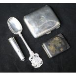 A Japanese match case, silver cigarette case, spoon, amber & gold mounted cigarette holder in silver