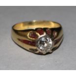 A gold, claw and collet set solitaire diamond ring, size F.