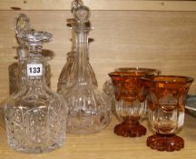 2 amber etched Great Exhibition vases, 5 decanters and a vase