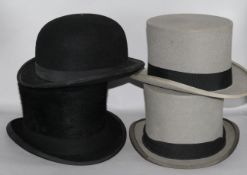 Three top hats and a bowler hat