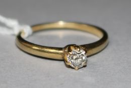 A gold and solitaire diamond ring, size O.