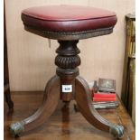 A late Georgian mahogany adjustable piano stool