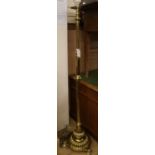 A Victorian brass standard lamp (converted) and shade, 170cm high