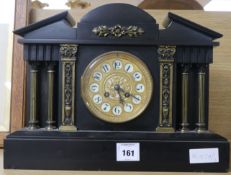A black slate classical clock