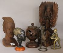 A collection of Balinese and African carvings