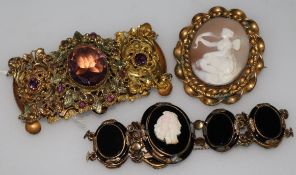 A gilt metal mounted cameo brooch and two 19th century bracelets.