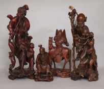 Four Chinese carved wood figures