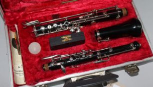 A Boozey & Hawkes oboe, cased