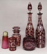 A pair of ruby overlay glass decanters, a pickle jar, glass powder bowl & cranberry shaker