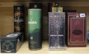 Ten bottles of whisky in presentation packs, including Chivas Regal, Glenfiddich, Johnnie Walker,