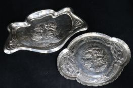 Two Edwardian silver 'Reynold's Angels' dressing table trays, Samuel M. Levi and A.E. Goodby &