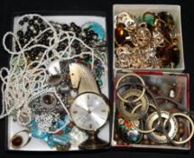 A collection of mixed costume jewellery including watches.