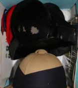 A Northern Rhodesian policeman's hat, a Spanish policeman's hat, various hat and related buttons,