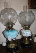 Turquoise and clear glass oil lamp and another