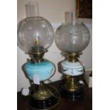 Turquoise and clear glass oil lamp and another