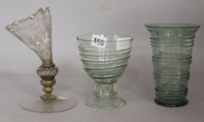 An early Venetian or facon de Venise enamelled glass goblet, a goblet and a beaker (3)