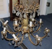 A gilt metal & lustre hung light chandelier