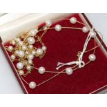 One 14ct gold and cultured pearl necklace and two 9ct gold and cultured pearl necklaces.