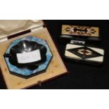 An Art Deco opal faced slate ashtray and two Bohemian inlaid snuff boxes