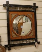 An Aesthetic period convex mirror, H.68cm