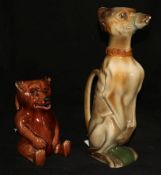 A Saint Clement pottery grey hound jug and a pottery bear jug