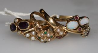 Seven assorted 9ct gold gem set dress rings.