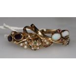 Seven assorted 9ct gold gem set dress rings.