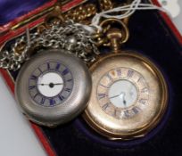 A gold plated half hunter pocket watch and a silver half hunter pocket watch, the latter with silver
